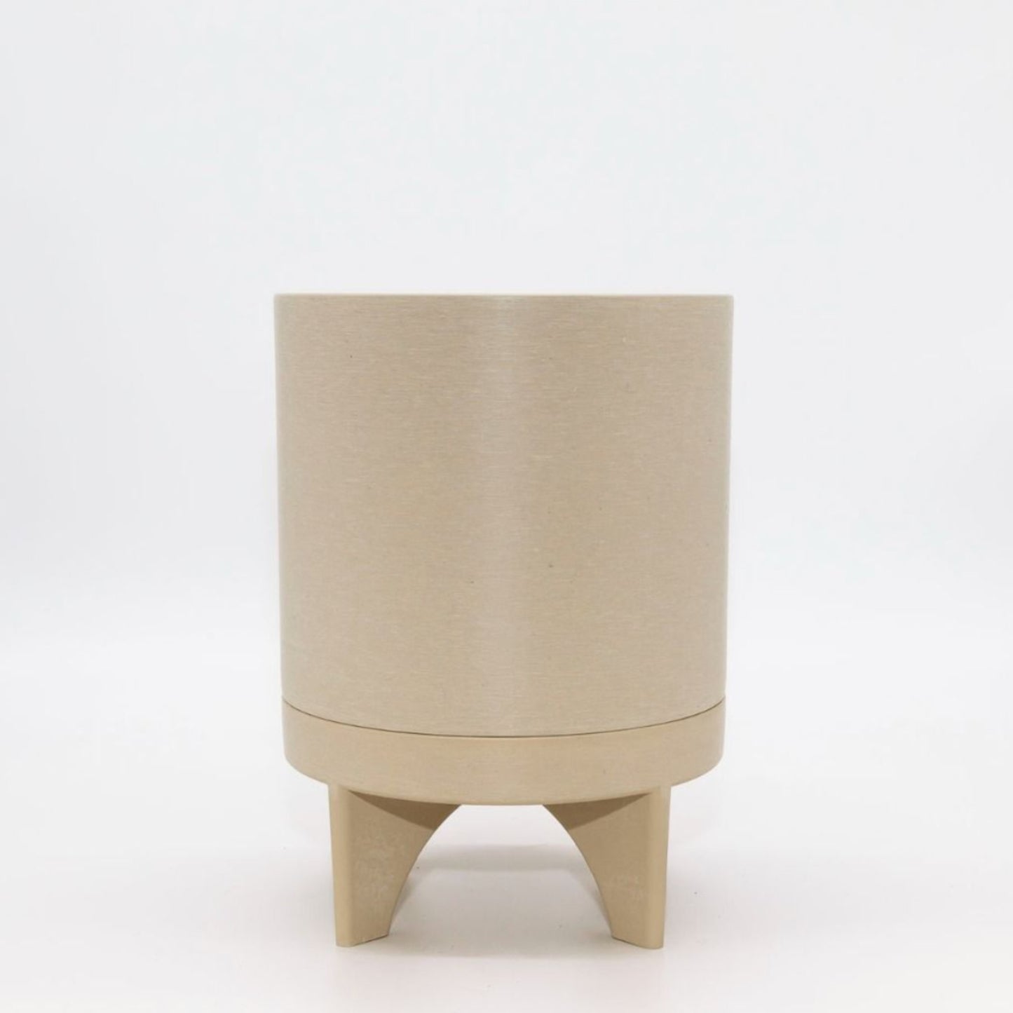 Single Florence recycled plastic plant pot with a smooth minimalist tapered silhouette on a clean white background, available in Australia. Tatami sand shown.