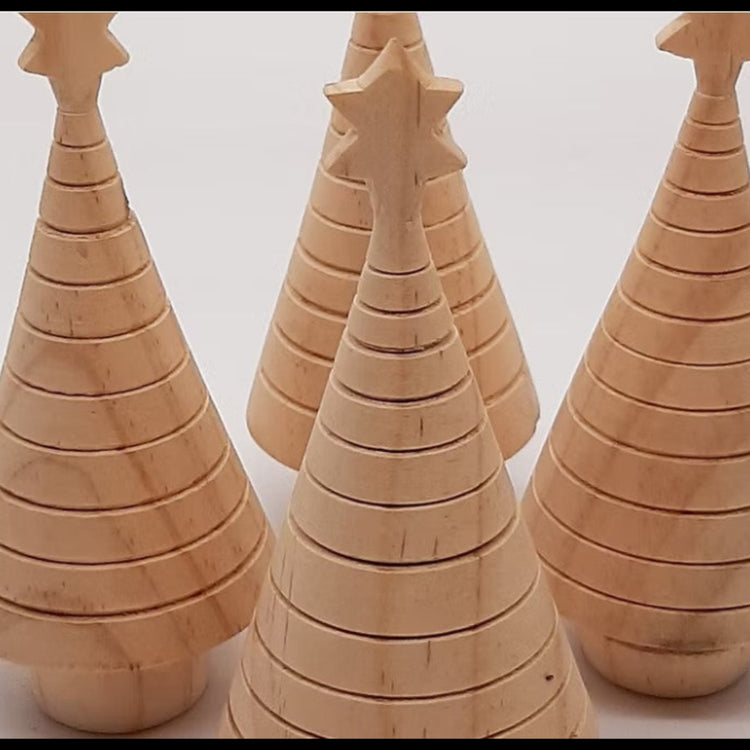 A selection of eco-friendly Christmas tree decorations made from 100% recycled wood.