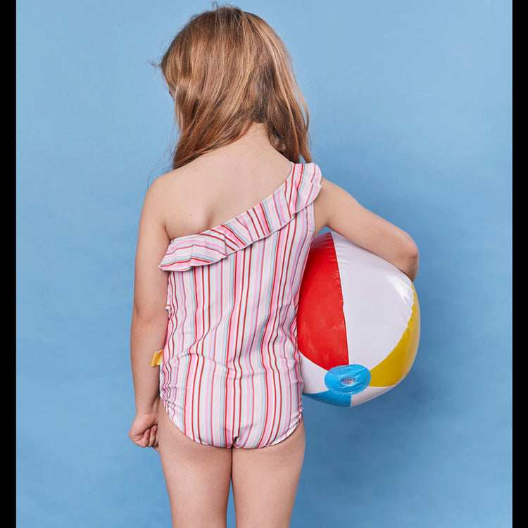Rear view of a child wearing the striped one piece swimsuit, showcasing sun smart back coverage.