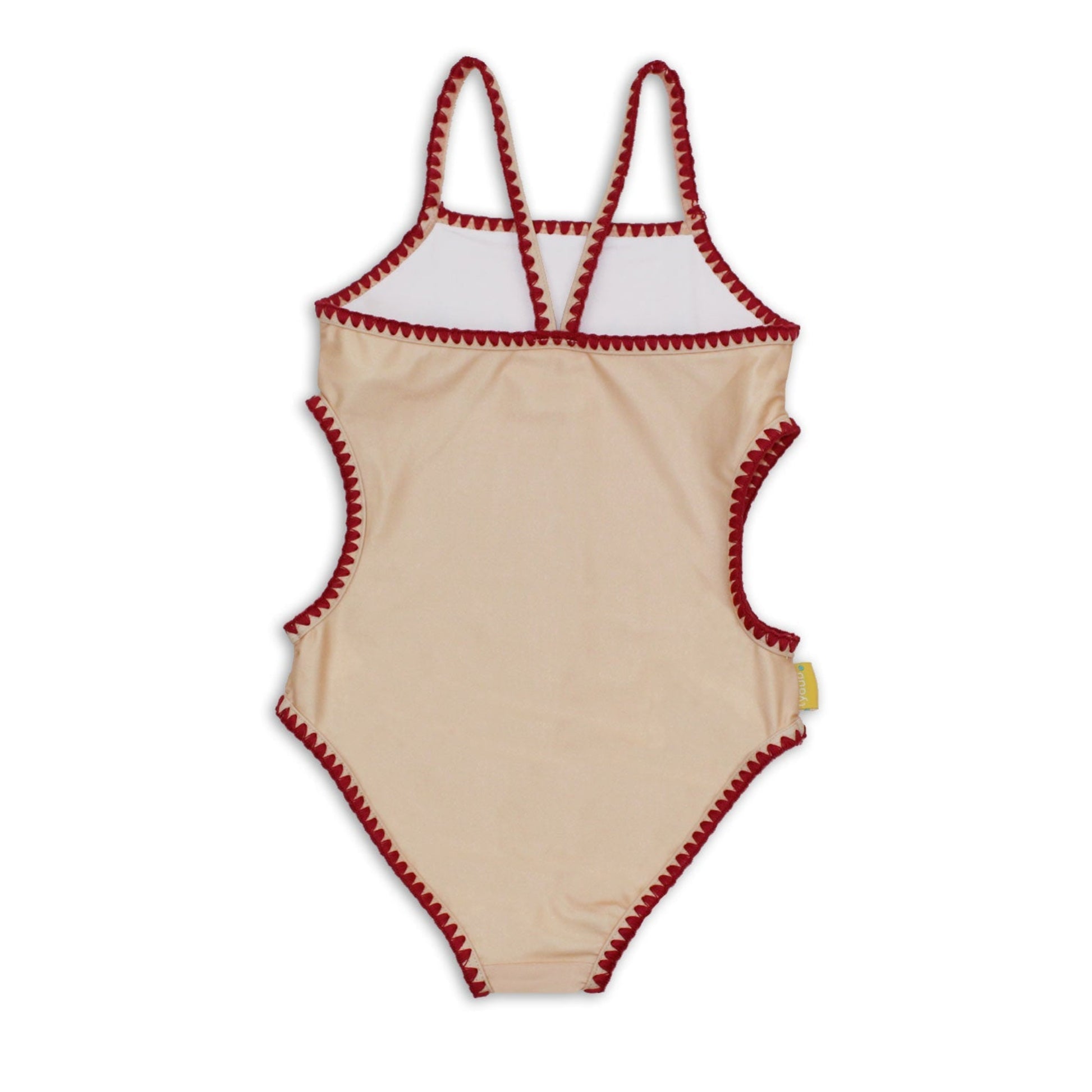 Rear view of the girls vanilla one piece bather showing the cross back strap layout and scalloped embroidery trim.