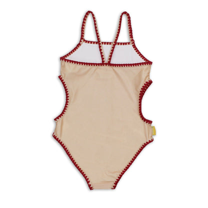 Rear view of the girls vanilla one piece bather showing the cross back strap layout and scalloped embroidery trim.