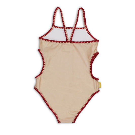 Rear view of the girls vanilla one piece bather showing the cross back strap layout and scalloped embroidery trim.