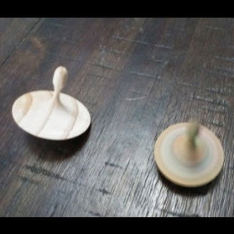Hand-turned recycled timber spinning top with a light unoiled finish, handcrafted in Australia by Lyons Woodturning.
