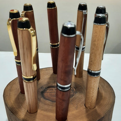 Custom handmade wooden pens showing natural timber grain variations and premium hardware fittings, made locally in Jindera, New South Wales.