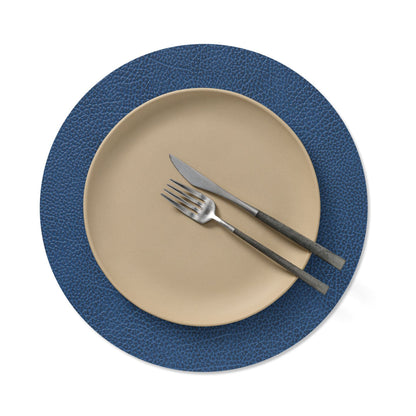 Circle recycled leather placemat featuring the signature LIND DNA Hippo texture with plate setting in navy blue.