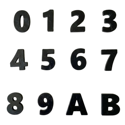 Custom recycled plastic house numbers for letterboxes with marbled texture black palette.