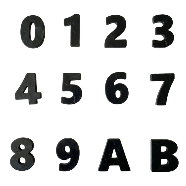 Custom recycled plastic house numbers for letterboxes with marbled texture black palette.