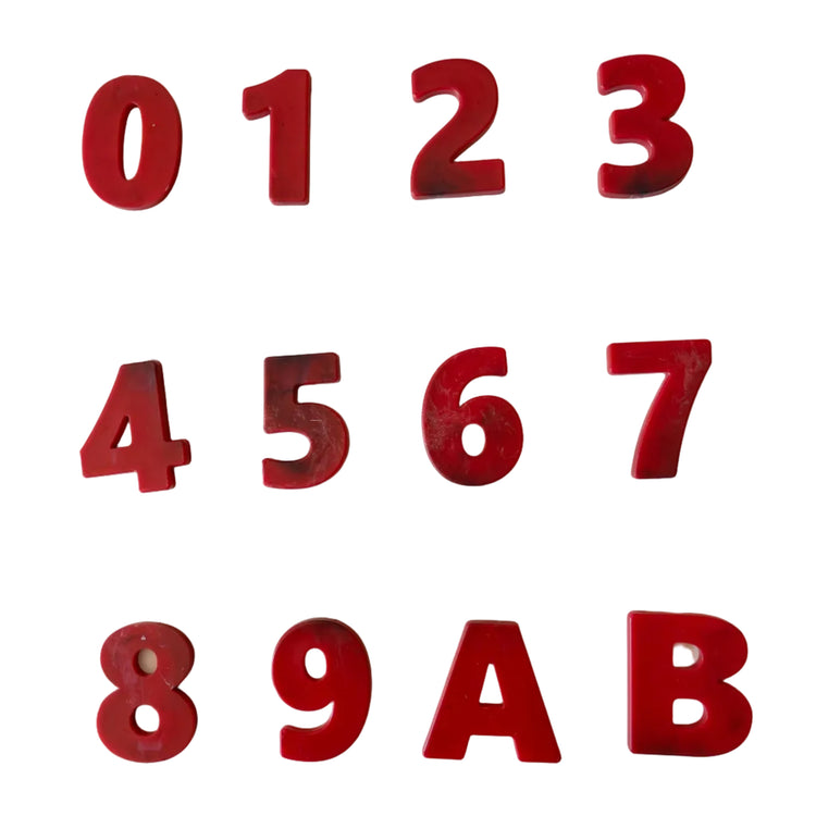 Custom recycled plastic house numbers for letterboxes with marbled texture red palette.