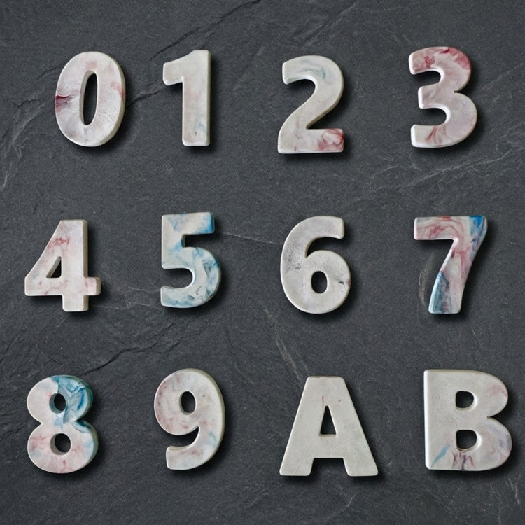 Custom recycled plastic house numbers for letterboxes with marbled texture white palette.