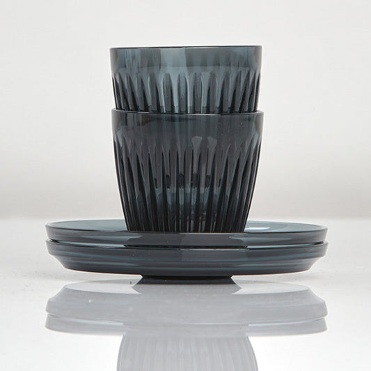 Complete HuskeeRenew 3oz espresso set of two cups and two matching saucers crafted from premium translucent recycled polymer in smoke.