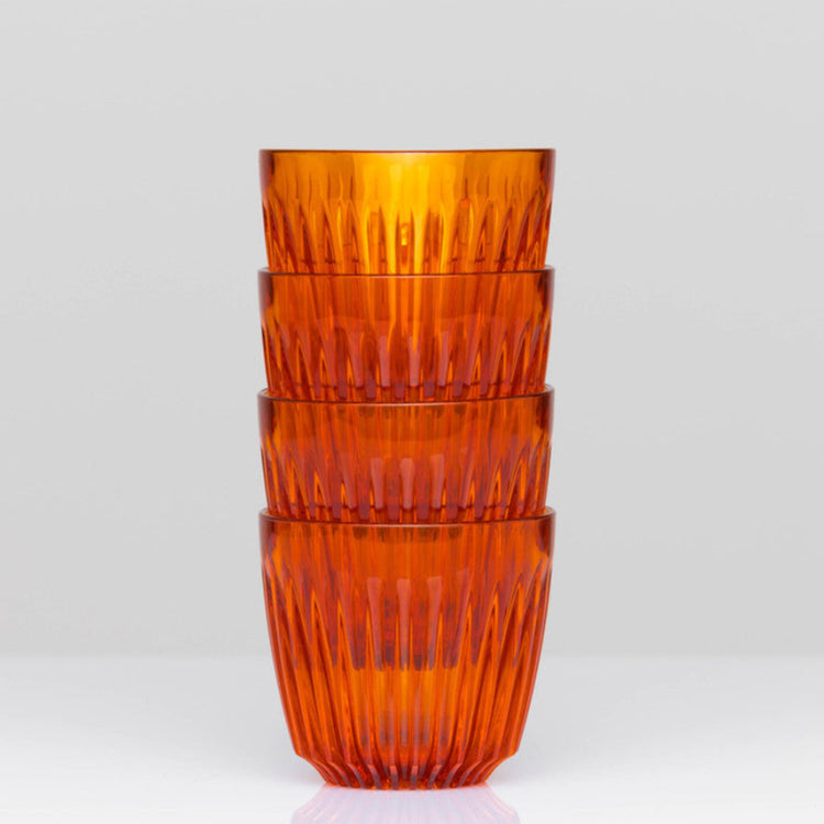 Complete HuskeeRenew 3oz espresso set of four cups without saucers crafted from premium translucent recycled polymer in amber.