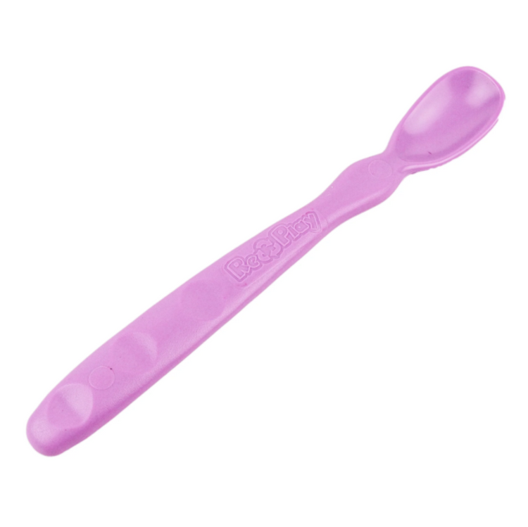 Close up view of the smooth rounded contour edges and gentle deep scoop depth on a non toxic infant weaning spoon in Purple.
