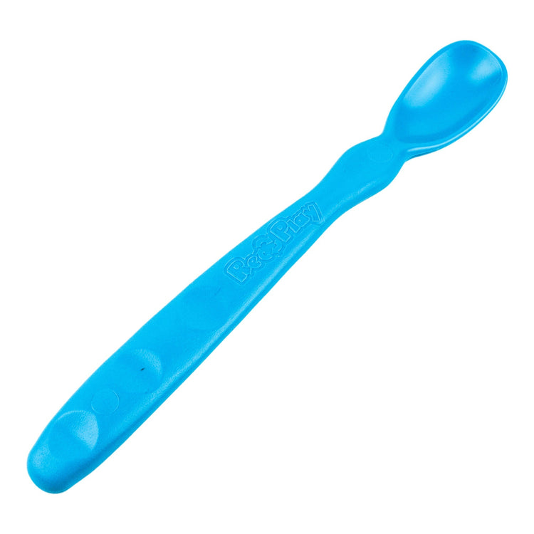 Close up view of the smooth rounded contour edges and gentle deep scoop depth on a non toxic infant weaning spoon in sky blue.