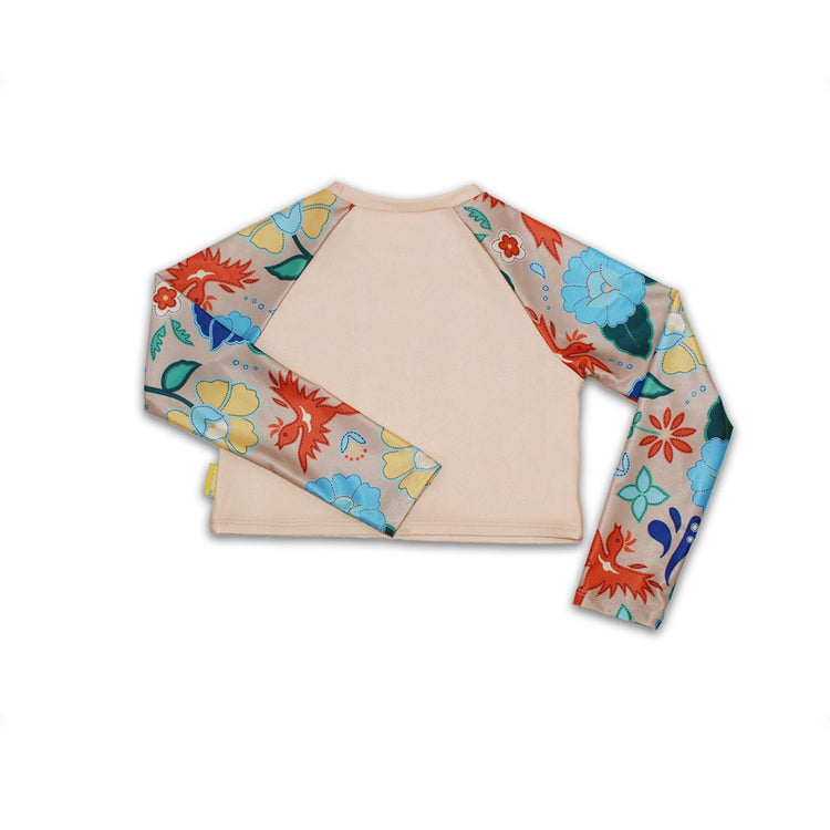 Back view of the kids long sleeve vanilla cropped rashie displaying complete sun smart shoulder and arm UV coverage.