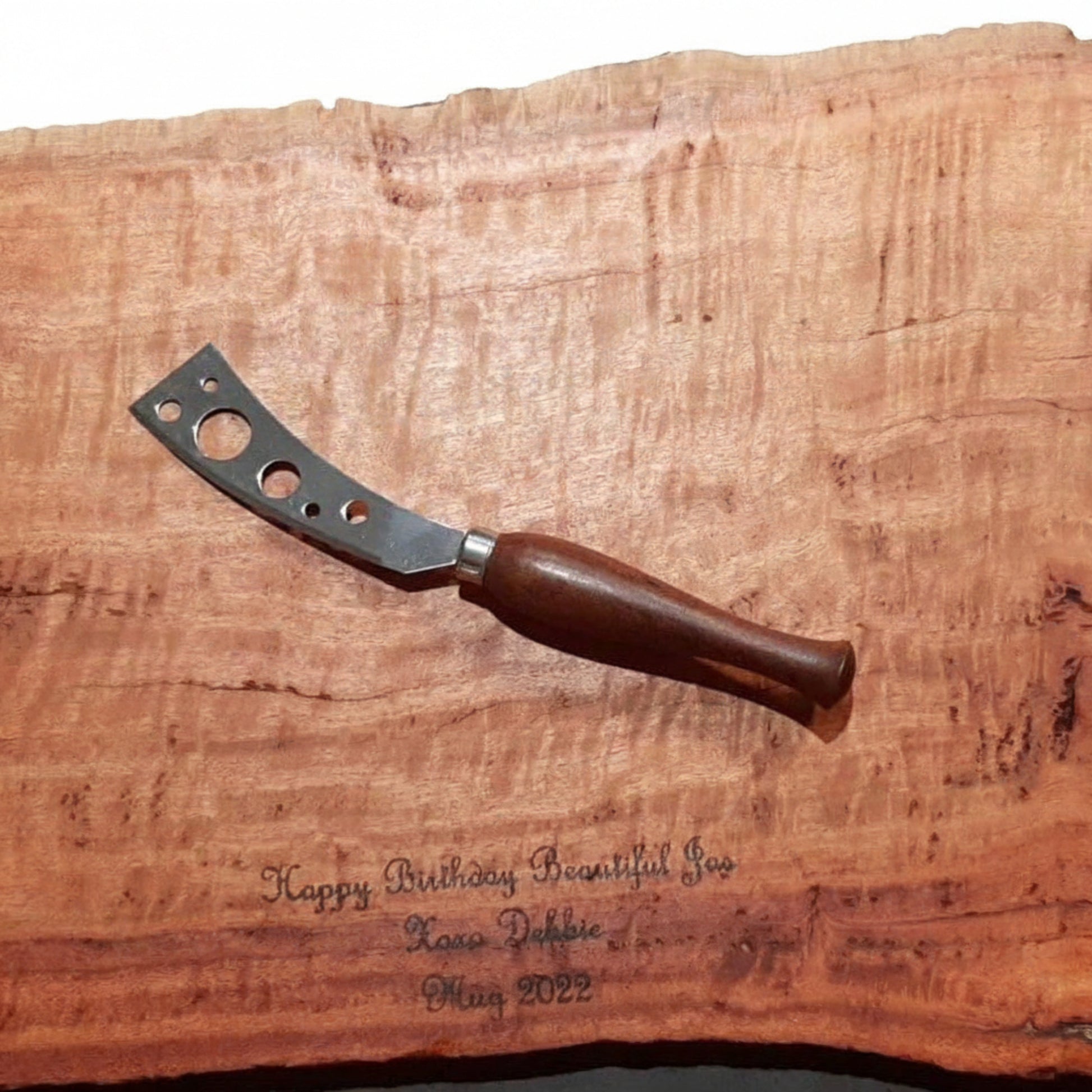 A large hand-finished recycled timber charcuterie board paired with a matching hand-turned wooden handle cheese knife, handcrafted in Australia.