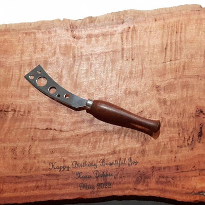 A large hand-finished recycled timber charcuterie board paired with a matching hand-turned wooden handle cheese knife, handcrafted in Australia.