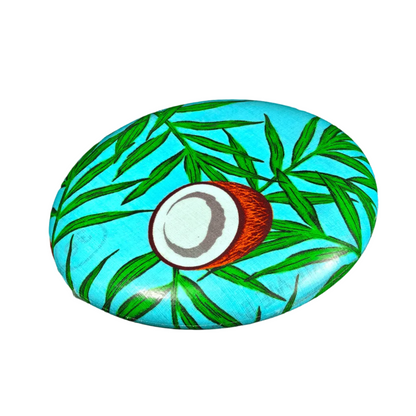 Standalone 230mm flying disc made from recycled Fijian beach waste showing vibrant, one-of-a-kind upcycled colour patterns in coconut.
