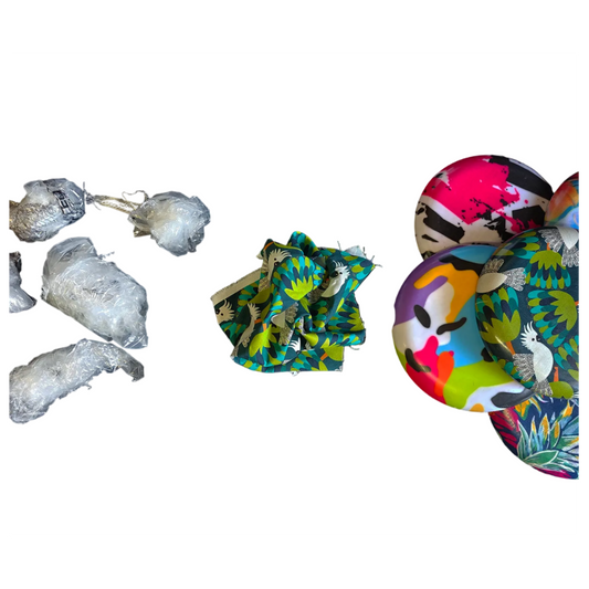 Standalone 230mm flying disc made from recycled Fijian beach waste showing vibrant, one-of-a-kind upcycled colour patterns showing the waste material used to construct the final product.