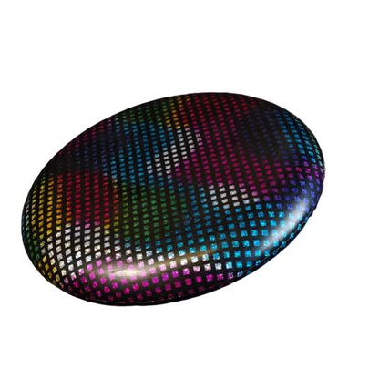 Standalone 230mm flying disc made from recycled Fijian beach waste showing vibrant, one-of-a-kind upcycled colour patterns in disco.
