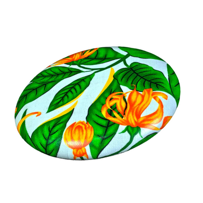 Standalone 230mm flying disc made from recycled Fijian beach waste showing vibrant, one-of-a-kind upcycled colour patterns in floral 3.