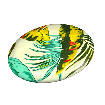 Standalone 230mm flying disc made from recycled Fijian beach waste showing vibrant, one-of-a-kind upcycled colour patterns in floral 4.