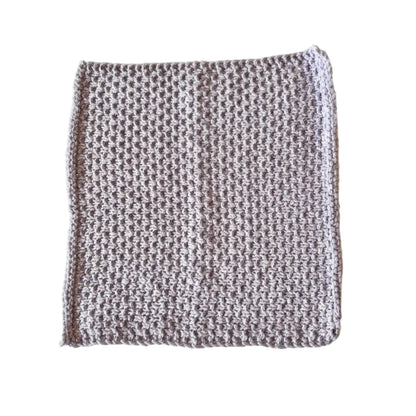 Mauve handmade knitted dishcloth made from absorbent recycled cotton for kitchen and bathroom use.