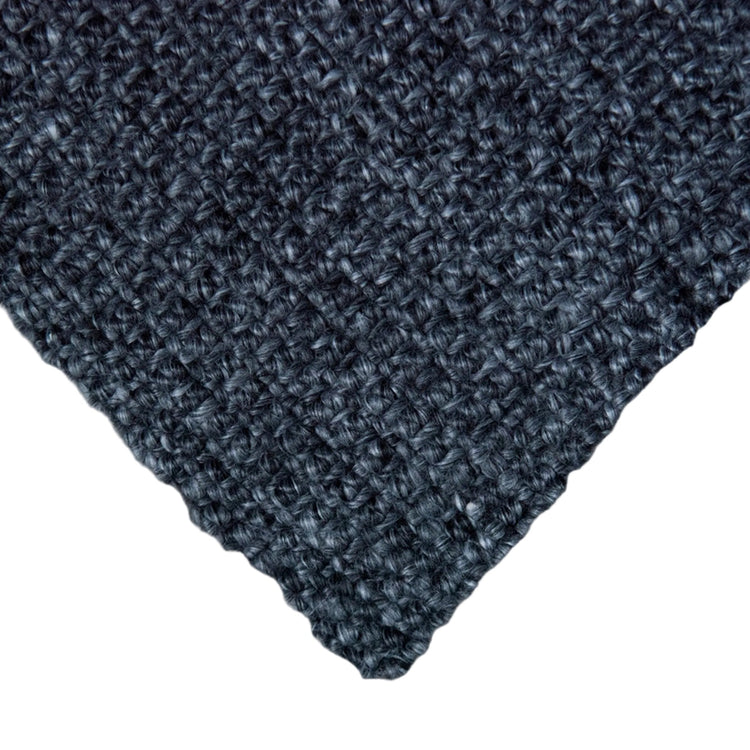 Zebra Home Nichols Lite slate grey indoor outdoor mat showing a detailed close-up corner weave made from 100% recycled plastic with a soft wool-like texture.