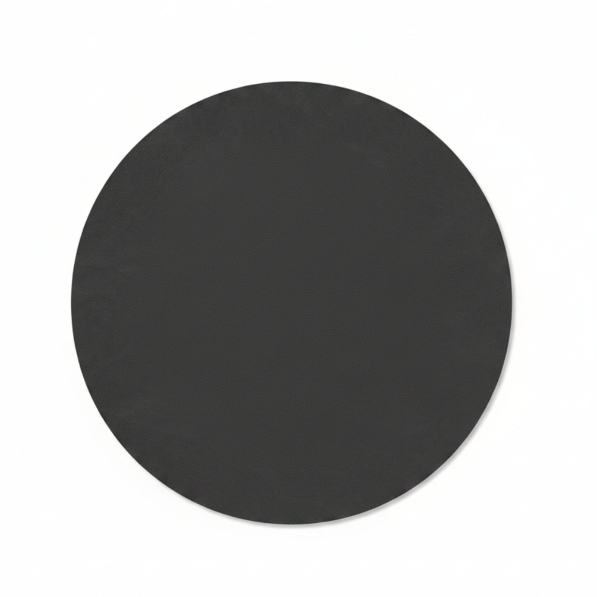 Circle recycled leather placemat featuring the signature LIND DNA Nupo texture.