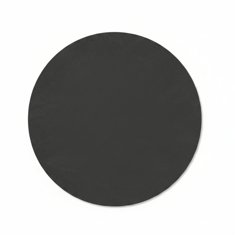 Circle recycled leather placemat featuring the signature LIND DNA Nupo texture.