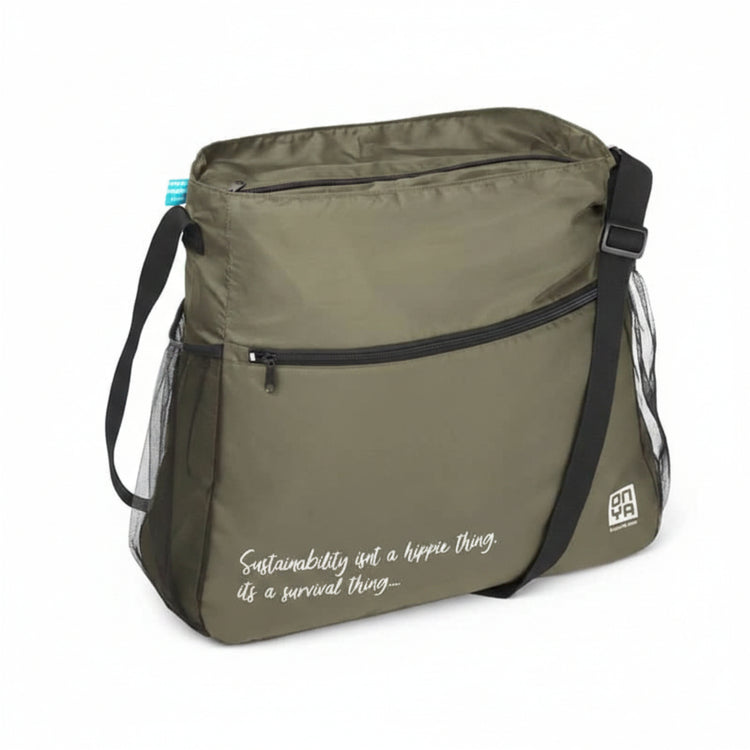 Single Onya packable crossbody side messenger bag showing an adjustable shoulder strap and spacious front compartment panel on a clean white background, available in Australia. Olive quote variant shown.