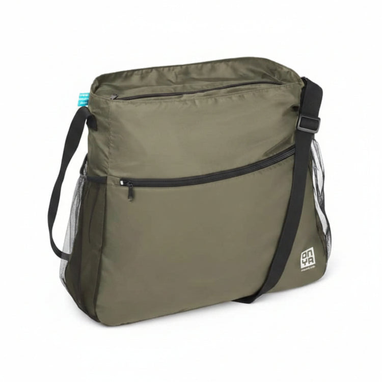 Single Onya packable crossbody side messenger bag showing an adjustable shoulder strap and spacious front compartment panel on a clean white background, available in Australia. Olive  variant shown.