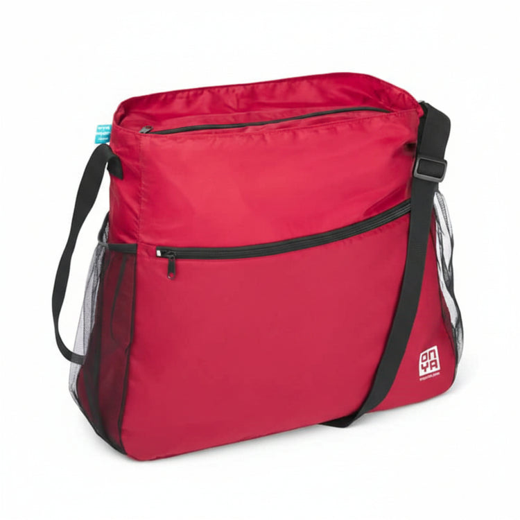 Single Onya packable crossbody side messenger bag showing an adjustable shoulder strap and spacious front compartment panel on a clean white background, available in Australia. Red variant shown.