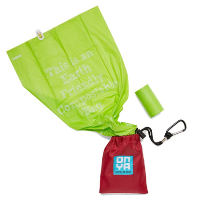 Onya dog waste disposal bags and fabric carry pouch combo kit featuring a durable carabiner clip and compostable poop bag roll on a white background, available in Australia in chilli.