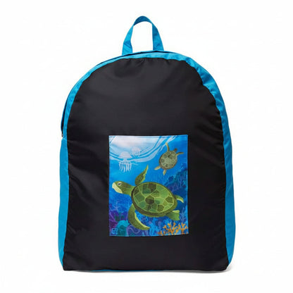 Onya foldable reusable backpack with padded shoulder straps standing with compact integrated keyring storage pouch on a clean white background, available in Australia in sea turtle variant.