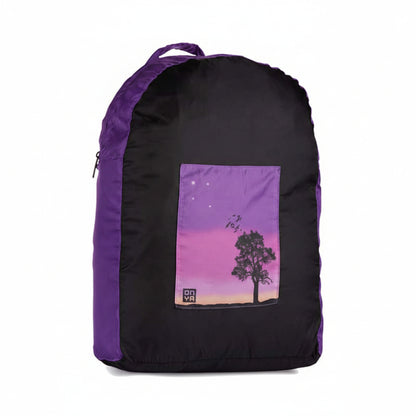 Onya foldable reusable backpack with padded shoulder straps standing with compact integrated keyring storage pouch on a clean white background, available in Australia in sunset variant.