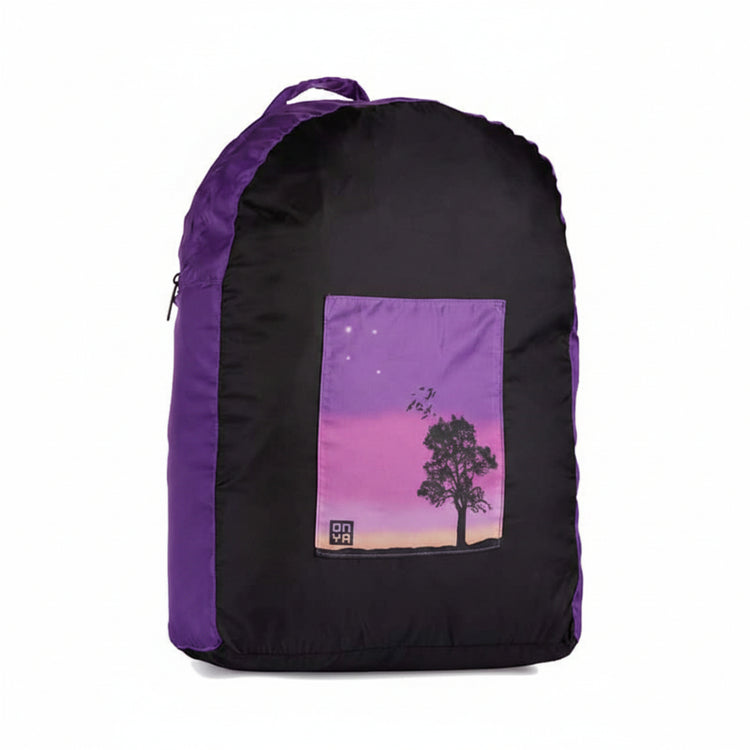 Onya foldable reusable backpack with padded shoulder straps standing with compact integrated keyring storage pouch on a clean white background, available in Australia in sunset variant.
