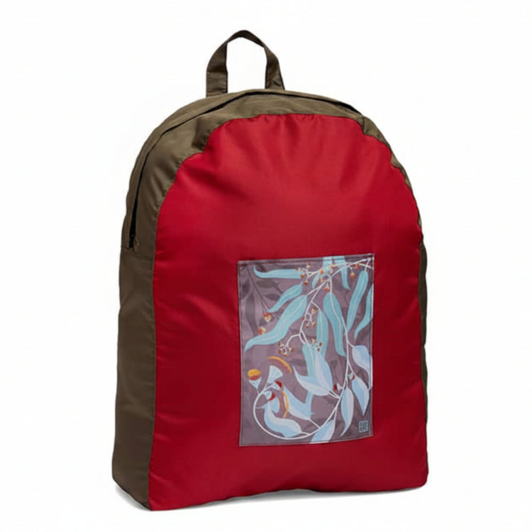Onya foldable reusable backpack with padded shoulder straps standing with compact integrated keyring storage pouch on a clean white background, available in Australia in dark leaves variant.