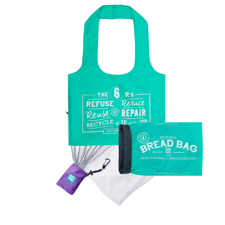 Onya reusable market kit containing a color matched foldable shopping tote bag, an eight pack of mesh produce bags, and a roll top bread bag on a clean white background, available in Australia. Aqua bags and purple mesh bag holder.