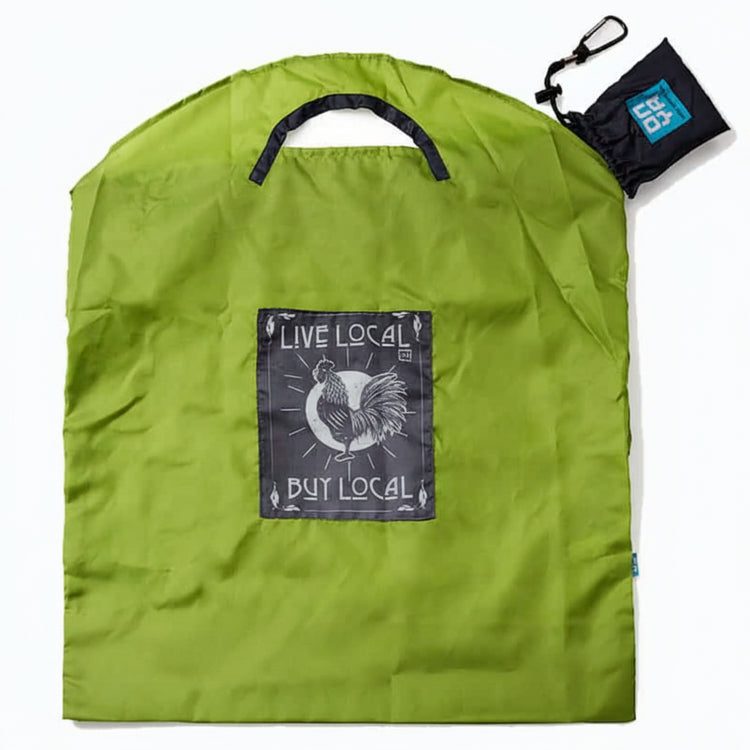 Onya reusable shopping bag with built in shoulder strap and checkout caddy loops next to its attached compact pouch on a clean white background, available in Australia in apple live local large variant.