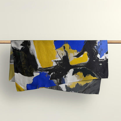 The Painterly abstract pattern fabric wrap draped over a wooden rod to show the upcycled deadstock material texture.