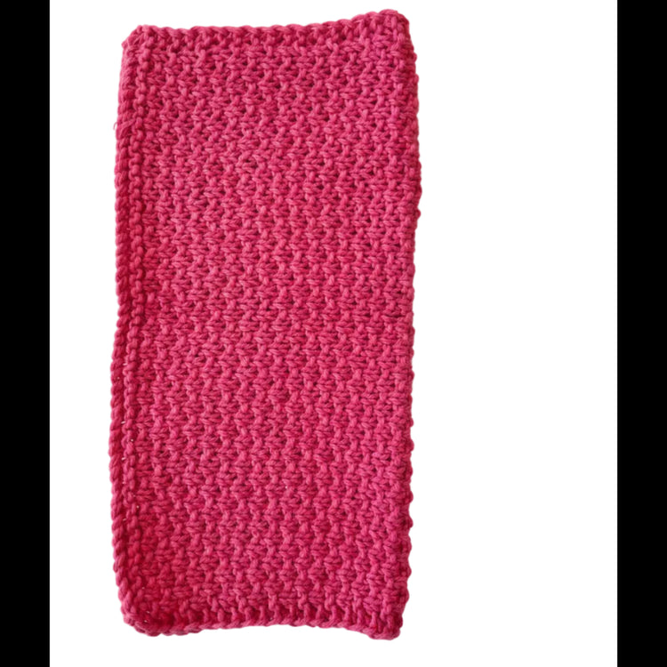 Peonie handmade knitted dishcloth made from absorbent recycled cotton, folded in half, for kitchen and bathroom use on a white background.