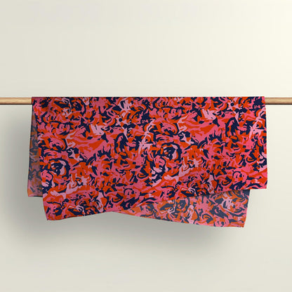 The Pink Mess abstract pattern fabric wrap draped over a wooden rod to show the premium deadstock material texture.