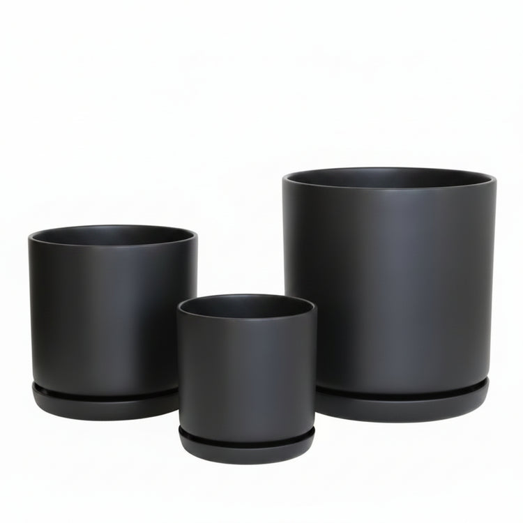 Coordinated Portland large set of three statement recycled plastic plant pots with matching saucers on a clean white background, available in Australia. Black shown.