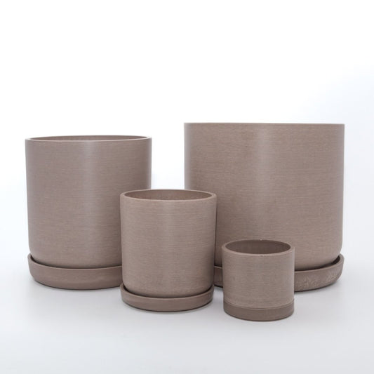 Complete Portland recycled plastic plant pot set of four graduated sizes with matching saucers on a clean white background, available in Australia. Beachwood variant shown.
