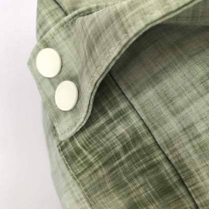 Micro view of the lightweight, highly breathable fabric weave engineered to regulate humidity and prevent mould in a refrigerator. Shown in gum leaf.