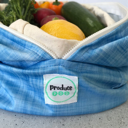 Macro view of the lightweight, highly breathable fabric weave engineered to regulate humidity and prevent mould in a refrigerator. Blueberry variant.