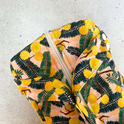 Single Produce Pod reusable veggie storage bag featuring a custom Wattle print top view with zipper closed.