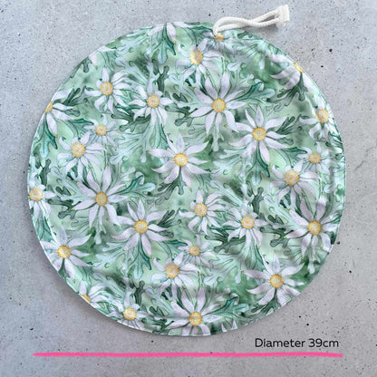 Produce Pod reusable bowl cover in a Flannel Flower print laid out on a surface top view.