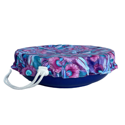 Produce Pod reusable bowl cover in a Gum blossom print fitted snugly over a serving dish, available in Australia.
