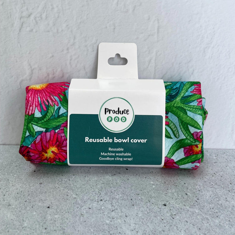 A Produce Pod reusable bowl cover in a Sea fig print folded in packaging.